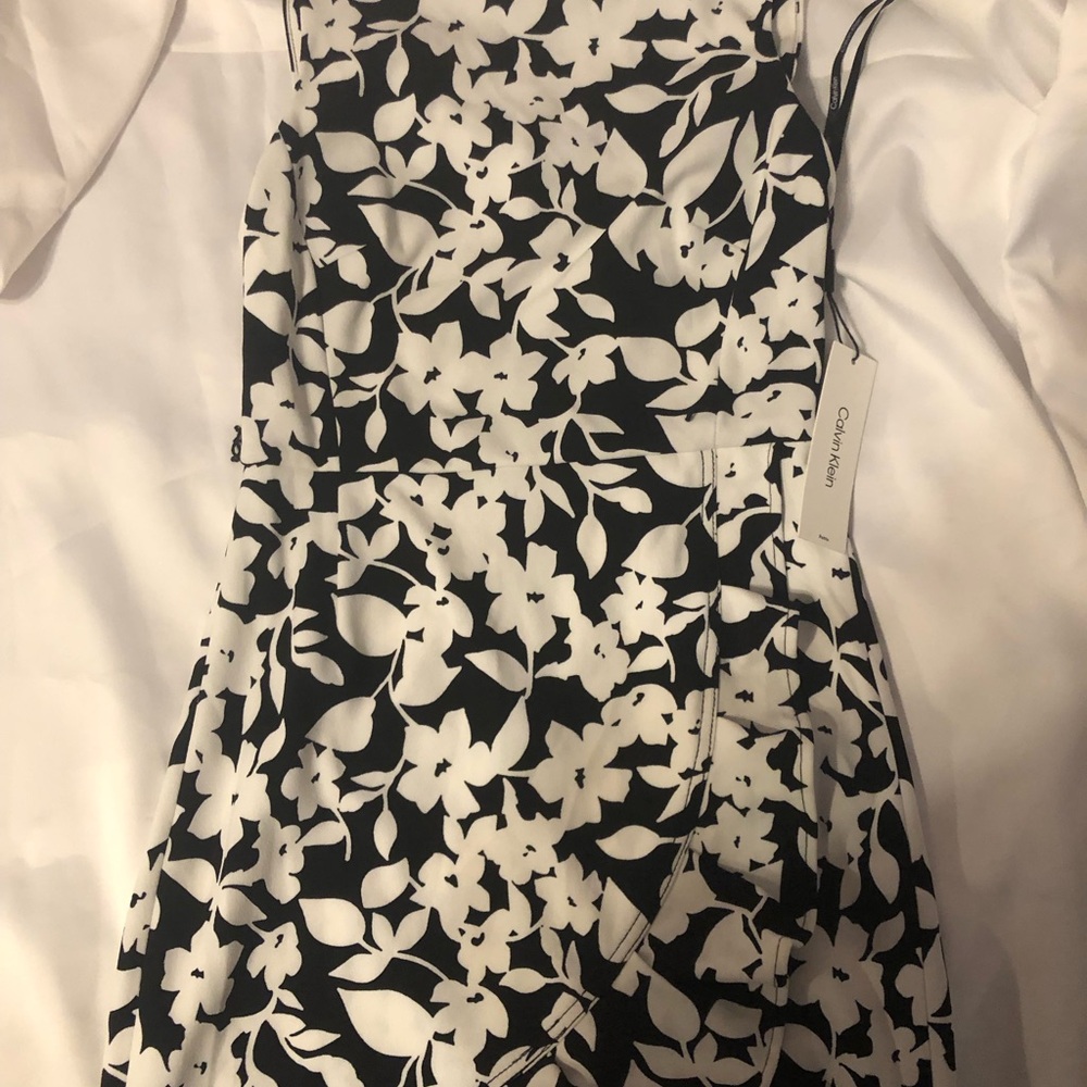 Calvin Klein dress black and white with tag on, medium size, never wear
